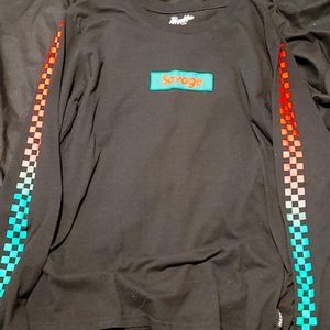 black, red, and green shirt